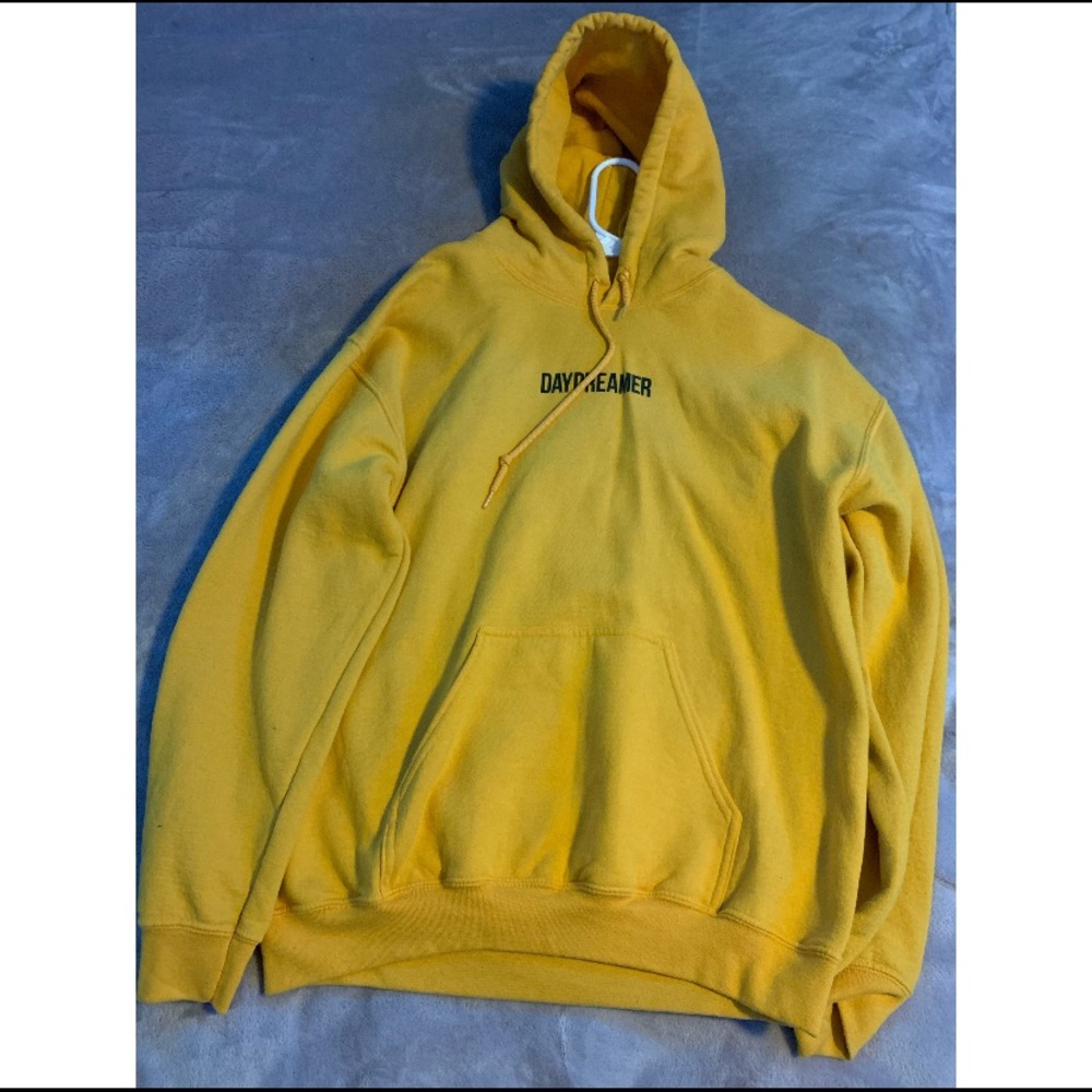 A yellow hooded sweatshirt